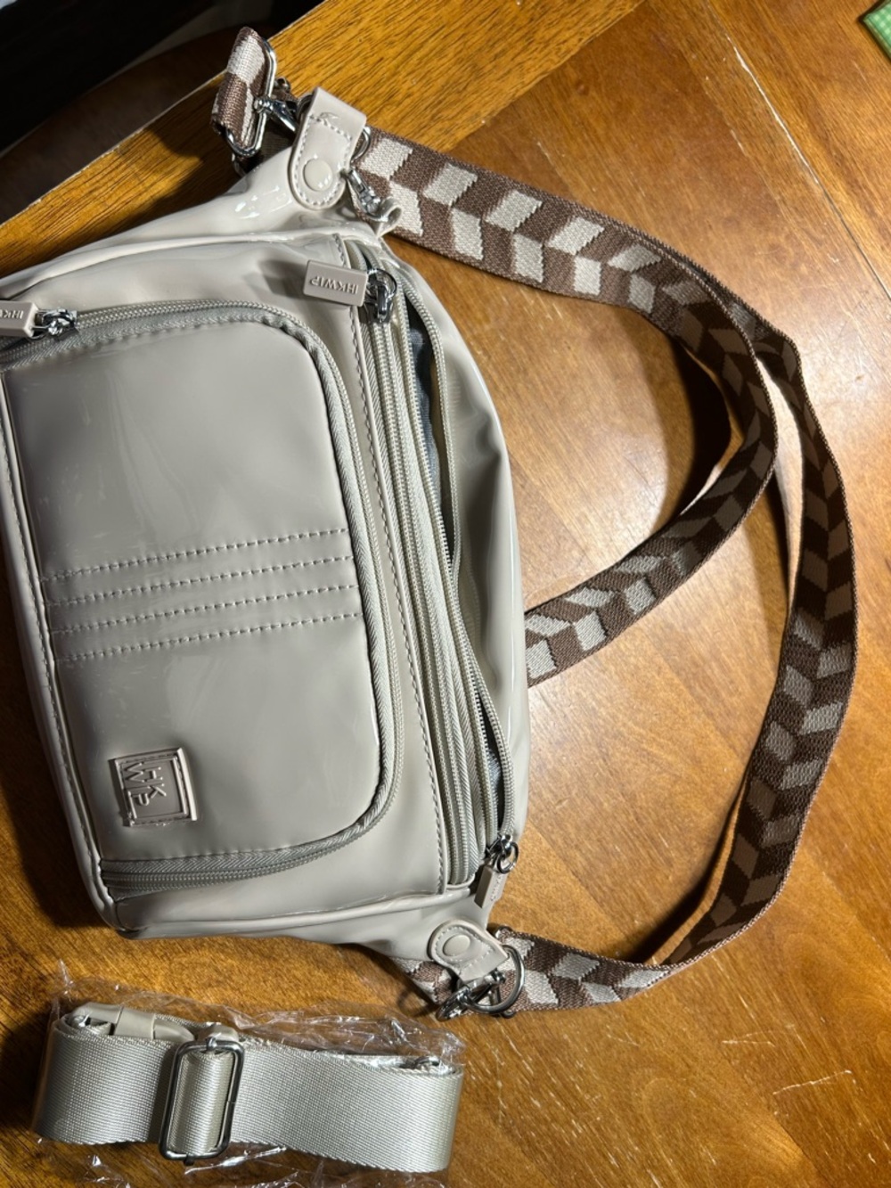 IHKWP CONFIDENCE ANTI THEFT SLING IN PATENT SAND COLOR